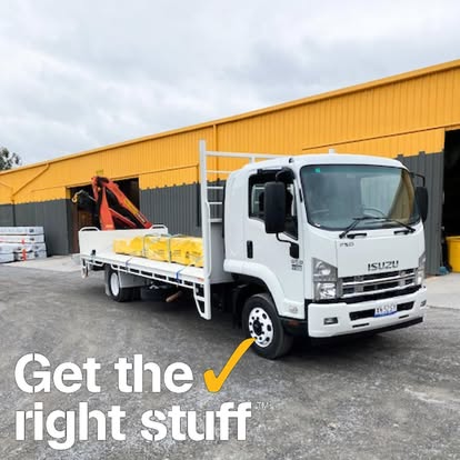 Mountain Timbers delivery truck loaded at the yard